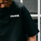 【予約販売7月中旬～下旬入荷】-Alex-(ｱﾚｯｸｽ) "do your own thing" ディストーションチェッカー バックプリントTシャツ